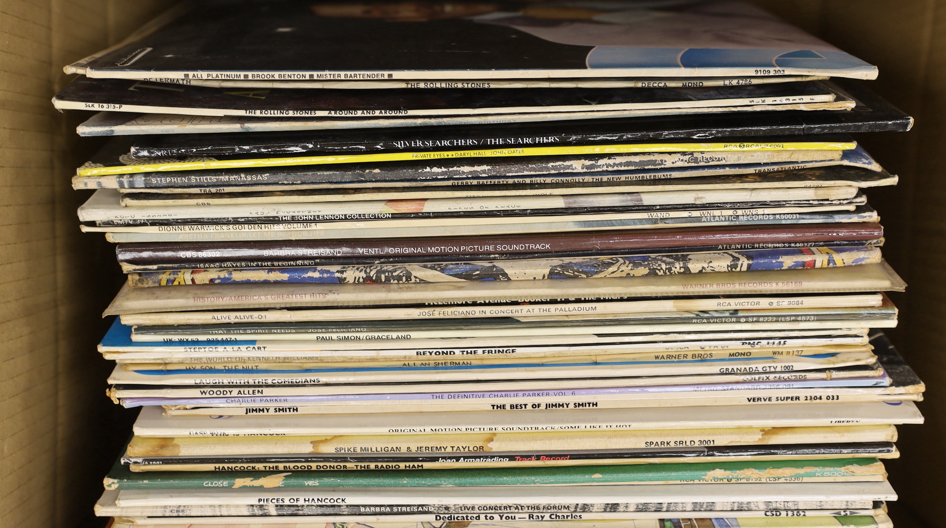 Sixty-four LP record albums with artists including; Brook Benton (signed album), Rolling Stones, Paul McCartney, Dionne Warwick, Elvis Presley, Grateful Dead, Paul Simon, Beyond the Fringe, Nina Simone, Ray Charles, John